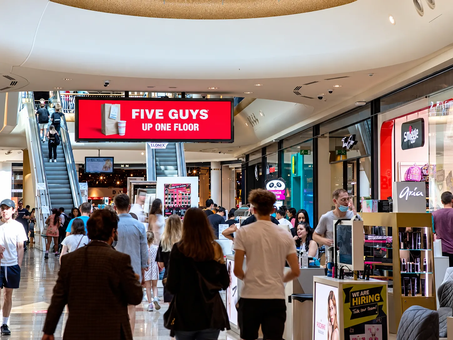 Digital advertising display inside a UK shopping centre