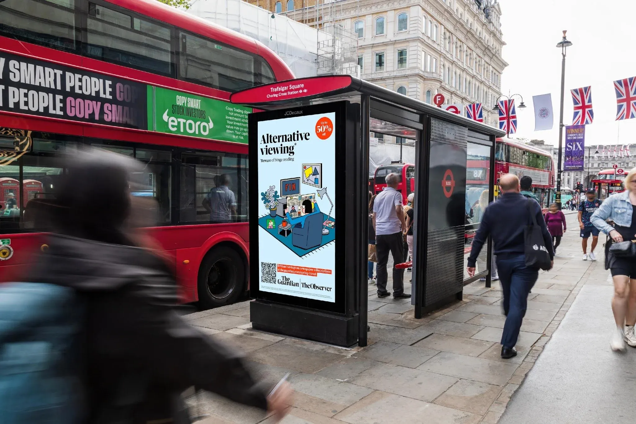Digital bus shelter advertising on a London street